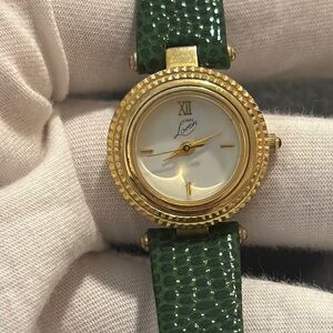 Vintage Van Loren gold case green embossed leather lizard texture strap